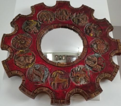 Wooden wall astrology mirror with signs of zodiac