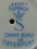 Blue Tuppack mark