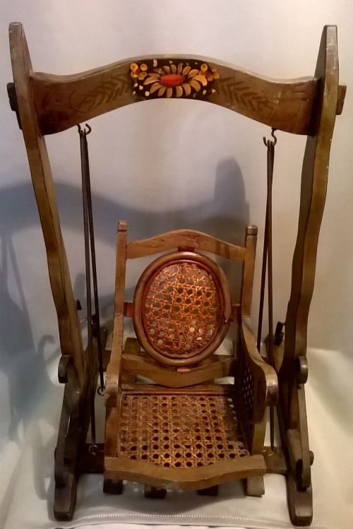 Antique doll swing